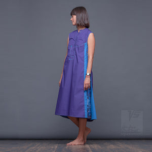 Experimental violet dress with geometrical pattern. 