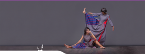 Two girls wearing Long sleeve experimental dress "Revolution" avant garde clothing. Dark blue, red and grey.
