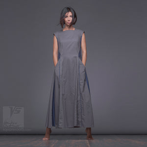Unique avant-garde long dresses Revolution. Modern innovation gowns. Achromaticity and dark-blue.