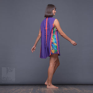 Experimental festival design purple-orange dress with geometric pattern.