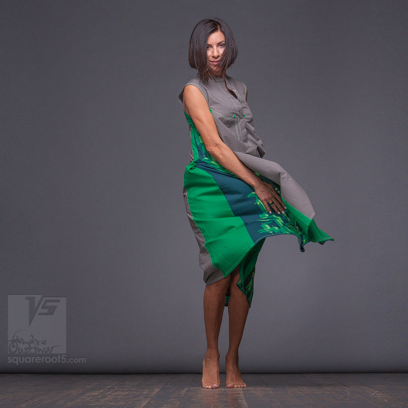 Long grey-green dress with Asymmetrical aesthetic.