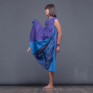 Bright, geometrical aesthetic dress with short sleeves. Violet and blue.
