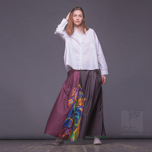 Avantgarde modern maxi long skirt with green pockets and bright abstract pattern by Squareroot5 wear