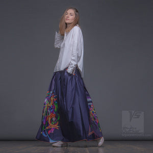 Uncommon long semi pleated skirt. Violet color with Abstract pattern
